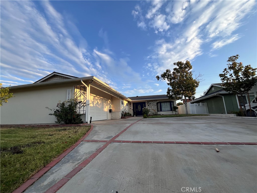 Welcome to this updated 3 bedrooms 2 bathrooms home located in a nice quiet area of Canyon Country. The large living room features a bay window that looks out to the front of the house. The home features an updated kitchen with newer cabinets, granite counter tops, and newer stainless steel appliance, which opens to the dining room. The home has recessed lights throughout living and dining area. All rooms have laminate floors. The entrance, dining room, bathrooms and the kitchen have tile floors. All bedrooms have fans with lights and mirrored closet doors. The backyard is really comfortable and inviting which also has a large covered patio for those family and friends gathering events. There are lots of fruit trees. Don’t miss out on this great home.