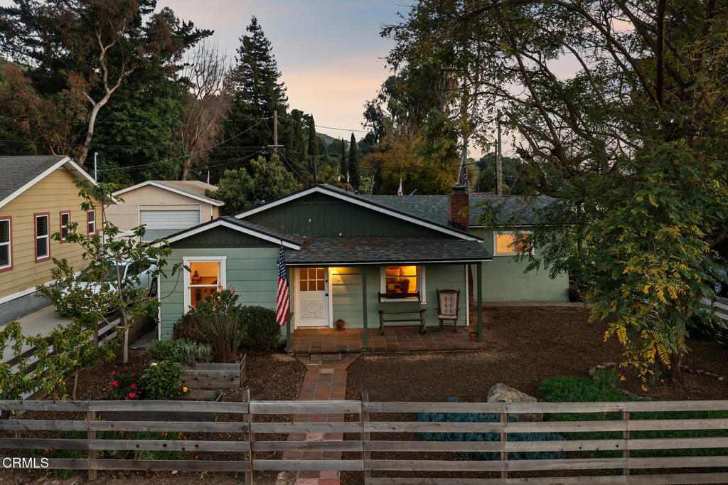 Rustic charm meets laid-back California living in this thoughtfully updated 3-bedroom, 2-bath Ventura bungalow. Situated on a generous 5,747 sq ft lot, this home blends warmth and character with everyday functionality.Already operating as a successful Airbnb investment, this property offers even more potential with its detached garage and spacious yard--ideal for building an ADU or converting into a detached guest house. Whether you're looking to expand income opportunities or create private space for guests, the setup is perfect for long-term value.The living room features a cozy wood-burning stove, custom woodwork, and natural light streaming through large windows. A warm, farmhouse-style kitchen flows into the dining space with vintage accents and modern convenience. The primary suite offers privacy and charm with built-ins and a stylish en-suite vanity.Outside, the backyard is set up for entertaining with string lights, a fire pit, and multiple seating areas. Tucked away on a peaceful street with easy access to Ventura's beaches, shops, and daily essentials--this home is the perfect mix of relaxed vibes and timeless character, ready to welcome its next chapter.