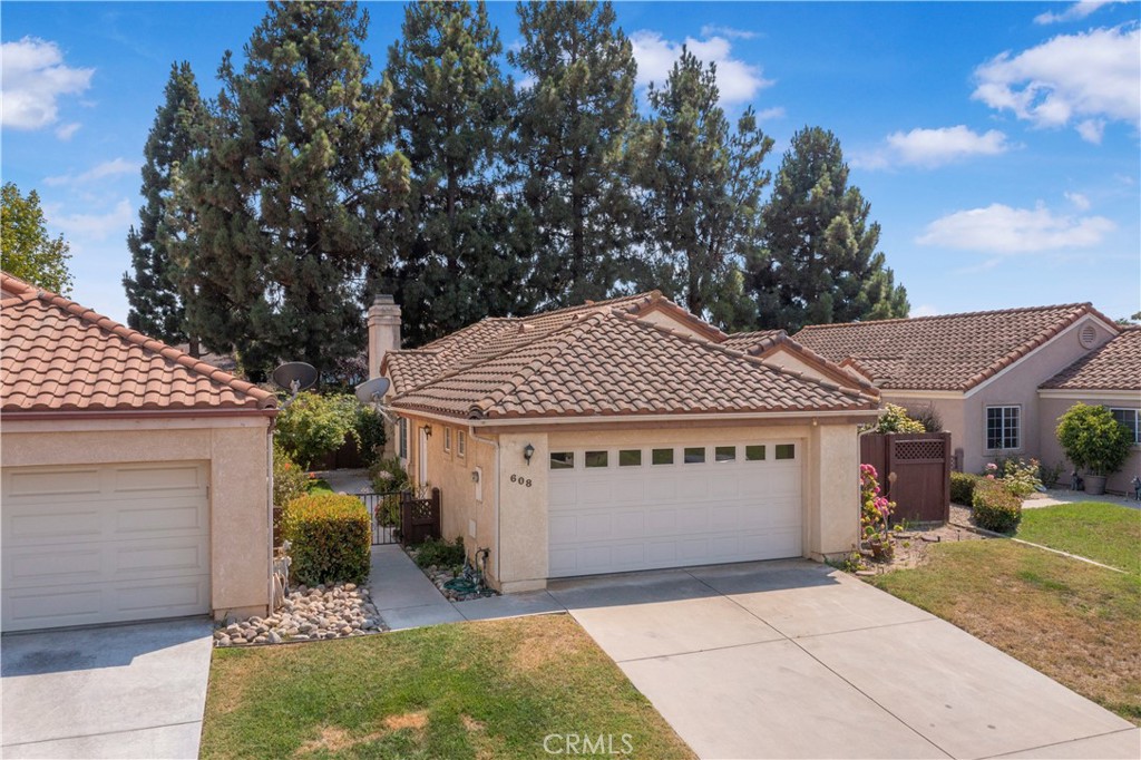 Welcome to this well-appointed 3-bedroom, 2-bathroom 1,439 sq ft home nestled within a private gated community in Santa Maria. Offering both comfort and convenience, this residence is designed with functionality and everyday living in mind.
Step inside to find a spacious living room with a cozy fireplace, a dedicated dining area that opens to the backyard patio—perfect for indoor-outdoor entertaining—and a generous kitchen featuring beautiful oak cabinetry and ample counter space. The home's open-concept design provides excellent flow, while plenty of built-in storage adds to its everyday practicality.
The primary suite includes a large walk-in closet, an en-suite bathroom, and a charming private patio—your own peaceful retreat. Additional features include an indoor laundry room and an attached 2-car garage.
Whether you're upsizing, downsizing, or searching for a low-maintenance home, this property offers flexibility and comfort in one of Santa Maria's most convenient locations near parks and amenities.