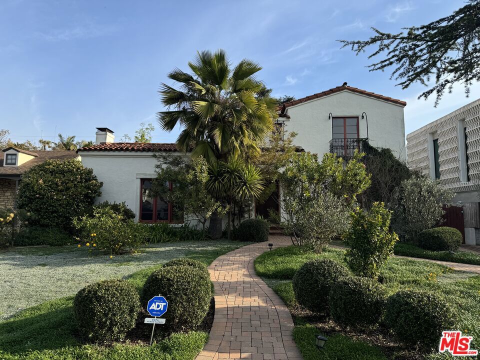 Nestled in one of Santa Monica's most coveted neighborhoods, this timeless Spanish-style residence exudes charm, character, and warmth. Situated north of Montana Avenue on a picturesque tree-lined street, this elegant home seamlessly blends old-world craftsmanship with modern comfort.Upon entry, a grand entertaining room welcomes you with soaring beamed ceilings, an inviting fireplace, and an abundance of natural light. The thoughtfully designed floor plan features three well-appointed bedrooms upstairs, each offering a serene retreat with classic details. The home's enchanting ambiance extends outdoors to a beautifully landscaped front yard and a lush, private backyard perfect for al fresco dining, quiet relaxation, or entertaining under the California sky.A rare opportunity to lease a property that embodies the sophistication and charm of Santa Monica's historic Spanish architecture while being moments from the best dining, shopping, and coastal living the area has to offer. Landlord is willing to negotiate lease up to 18 months.