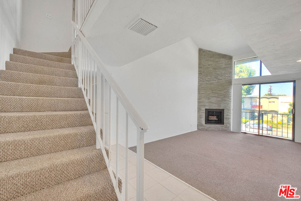 Discover your dream home in Studio City! This top-floor corner unit offers 1,771 sqft of bright and spacious living space, featuring two primary suites, two bathrooms, plus a large loft. Enjoy four balconies, high ceilings, and a cozy fireplace. The unit comes with a wet bar, two covered parking spaces, and ample storage.Central air ensures year-round comfort, and laundry facilities are conveniently located in the building. Located a short distance from Ventura Blvd, this is a must-see opportunity for those seeking a vibrant urban lifestyle in the heart of Studio City!