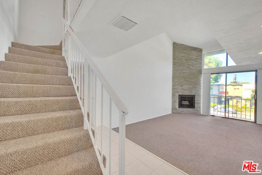 Discover your dream home in Studio City! This top-floor corner unit offers 1,771 sqft of bright and spacious living space, featuring two primary suites, two bathrooms, plus a large loft. Enjoy four balconies, high ceilings, and a cozy fireplace. The unit comes with a wet bar, two covered parking spaces, and ample storage.Central air ensures year-round comfort, and laundry facilities are conveniently located in the building. Located a short distance from Ventura Blvd, this is a must-see opportunity for those seeking a vibrant urban lifestyle in the heart of Studio City!