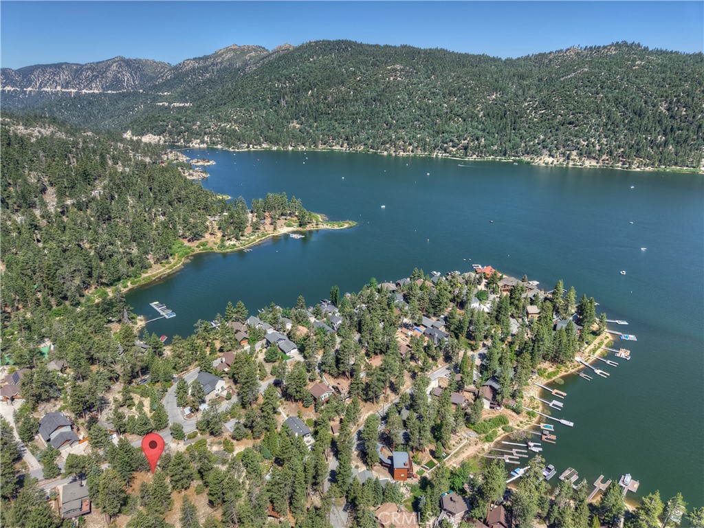 ATTENTION BUILDERS, DEVELOPERS, OR INVESTORS! A rare offering of two adjacent homesites at the entry to Pappose Bay. Each lot measures approximately 61' X 145' with a gentle downslope, making it easy to build on. Corner markers are present and a topo map is available for each lot. Buy one lot separately or both to create a .4 acre homesite. All utilities available to the property include city water, natural gas, electric, sewer and city-maintained roadway.
