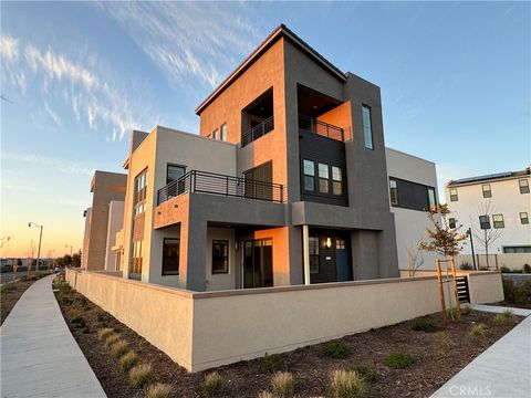 Photo of 9331 Astor, Irvine, CA 92618 (MLS # OC26073029)