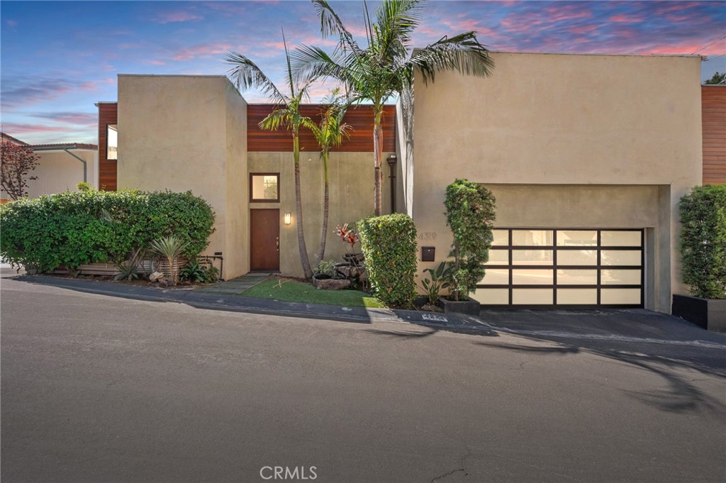 Welcome to your Woodland Hills Retreat! Perched south of the boulevard in one of Woodland Hills’ most sought-after neighborhoods that combines timeless charm with modern upgrades, offering the perfect balance of comfort, style, and California living. This beautifully maintained home invites you in with a warm and open floor plan and 2-story high ceilings that effortlessly blends indoor and outdoor living. The living room features abundant natural light and a cozy fireplace, creating the perfect atmosphere for both relaxing evenings and entertaining guests. The kitchen is designed with functionality and style in mind, ample counter space, and direct access to the backyard. Upstairs, the spacious bedrooms provide privacy and comfort; all of the bathrooms have been remodeled. The primary suite offering serene views and plenty of closet space with a high-end steam shower. Step outside to your private oasis, where lush landscaping, mature trees, and a generous patio area set the stage for summer barbecues, family gatherings, or simply unwinding in your own quiet escape. Additional highlights include Paid Off Solar, which covers 100% of the electric bill for the owner, a 2-patio backyard, a two-car garage, central HVAC, and a prime location just minutes from Ventura Boulevard’s shops, dining, and entertainment, as well as easy access to Topanga Canyon and the Westside. Don’t miss this rare opportunity to own a home in Woodland Hills that offers the lifestyle, location, and space you’ve been waiting for. Schedule your private showing today and experience this home yourself!