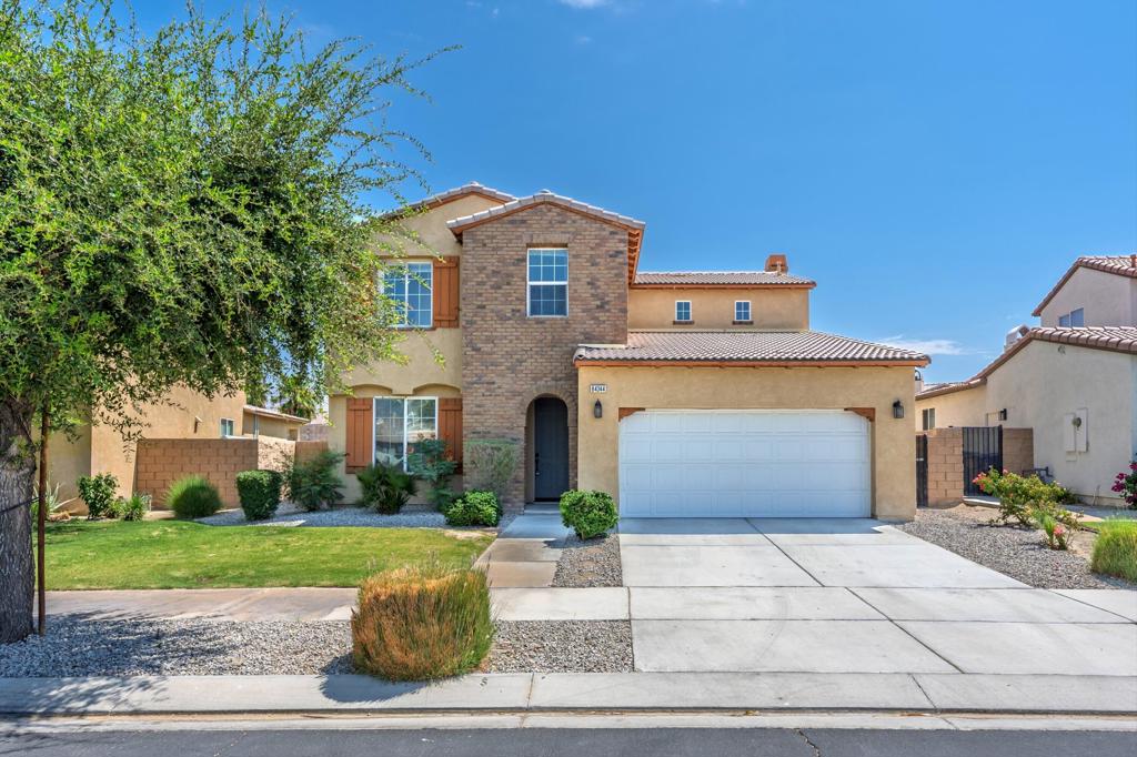 Welcome to the beautiful gated community of Terra Lago! This two story four bedroom, two and 1/2 bath home is move in ready for your family. Open concept floor plan with great room, kitchen and dining area with butler pantry area. Spacious primary bedroom and dual vanity bathroom. Home has expansive tile floors and NEW neutral paint and carpet throughout. Enjoy all that Terra Lago has to offer - lake, walking trails, clubhouse, fitness center, game room with billiards and ping pong. Banquet room for larger social gatherings or private parties. Desert shopping, dining, entertainment and schools all close by. Schedule your tour today and imagine life here! Short term rentals are allowed in Terra Lago per HOA guidelines.