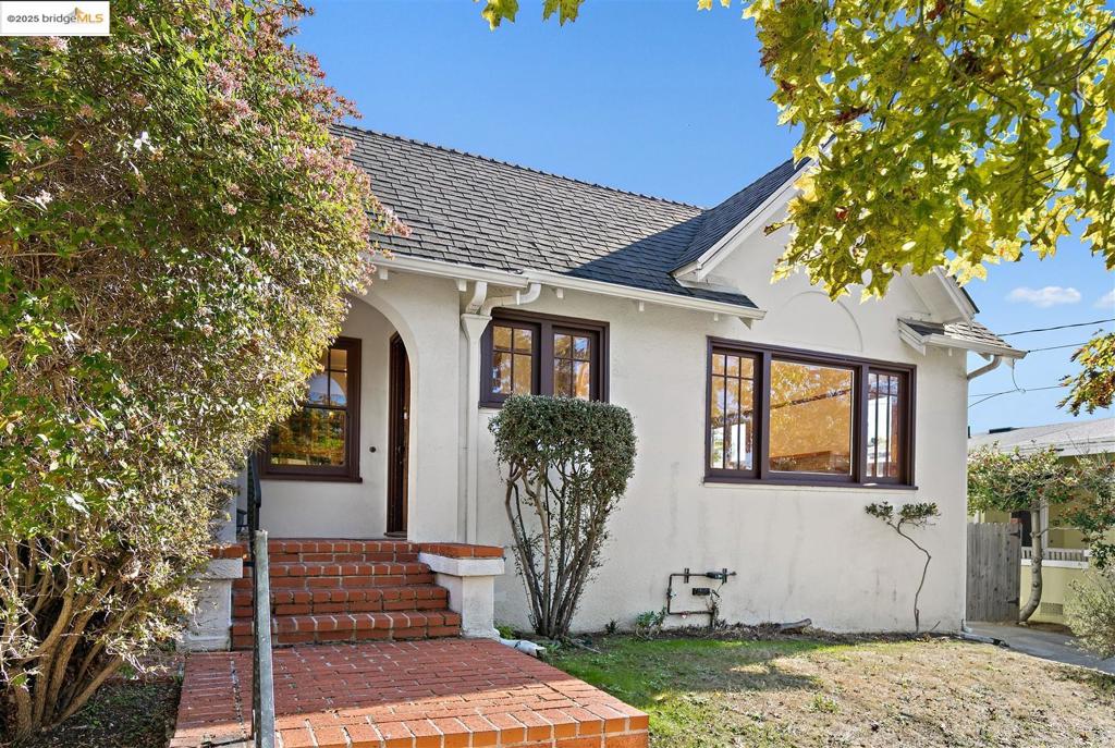 This charming 3+ bedroom Craftsman bungalow on a sought-after street in Berkeley’s desirable Thousand Oaks neighborhood blends timeless character with thoughtful updates. A classic brick walkway leads to a welcoming front porch and formal entry. Inside, the spacious living room is bathed in natural light and features gleaming hardwood floors and a cozy wood-burning fireplace. The separate formal dining room retains its vintage charm with a stunning original built-in butler’s pantry. The updated kitchen offers modern cabinets, granite countertops, and stainless-steel appliances. The renovated bathroom features a large shower stall with dual shower heads, custom floor and wall tile work, and a stylish built-in vanity. Three generous bedrooms with dual-pane windows provide comfortable living space, while a large sunroom off the back bedrooms offer flexibility as a home office, playroom, or guest space. Step outside to a private backyard, a blank canvas ready for your personal vision. An oversized detached one-car garage completes the property. Just blocks from Solano Avenue’s vibrant dining and shopping scene with local favorites like Zachary’s, The Oaks Climbing Gym, Lavender Bakery, Taqueria Talavera and more. Bed count differs. Buyer to investigate. Buyer to verify use of space.