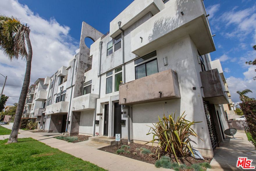 Three levels of contemporary luxury, right in the heart of Beverly Crest. This 2,000-square-foot, 3 bedroom, 3.5 bathroom contemporary townhouse combines privacy, style, and effortless convenience with every bedroom offering its own en suite retreat. The main floor is built for living and entertaining, with soaring ceilings, tons of natural light, a powder room, and an open flow between the dining area, living room, and updated kitchen with modern appliances and finishes. Upstairs, two spacious and private guest suites each feature large closets and private baths. You'll also find the laundry room with a washer and dryer. Further up, the entire top floor is dedicated to the stunning primary suite complete with a private patio, walk-in closet, and spa-worthy bathroom with dual vanity. Through the ground floor foyer and mudroom, you have direct access to a secure, underground garage with two dedicated parking spots ensuring convenience and peace of mind. Every detail is designed for comfort and sophistication with a layout that offers true privacy for everyone at home. With only five units in the complex, exclusivity is built in. Set in the coveted Beverly Crest neighborhood (right between Pico-Robertson and Carthay Square), you're in the middle of it all with Beverly Hills, West Hollywood, Hancock Park, Miracle Mile, and West LA all within easy reach. You (and your pets!) will enjoy the quiet, upscale charm of the area while being minutes from the Beverly Center, Rodeo Drive, The Grove, Museum Row, and the Sunset Strip where all of LA's best dining, shopping, entertainment and culture reside. Perfect for couples, roommates, work-from-home creatives, or a single person who wants to live large. This townhouse delivers the kind of everyday luxury that makes you wish you lived here already.