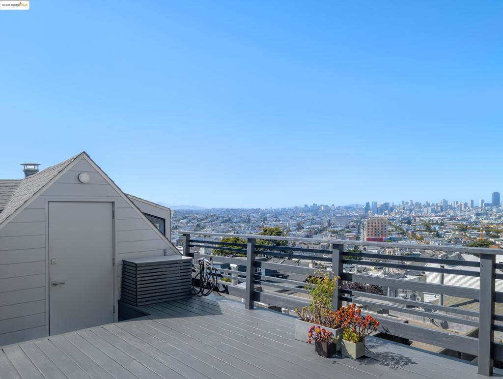 Perched atop the coveted north slope of Bernal Heights, 53 Elsie Street is a retreat that frames the San Francisco skyline like a work of art. This thoughtfully appointed residence offers Dolby Atmos speakers throughout, automated window treatments, integrated appliances, and bifold glass doors that lead seamlessly to the expansive lower deck—perfect for indoor-outdoor living. The oversized primary suite features its own upper deck and arguably the best views in Bernal. This home even has a gated doggie lawn for all of you with fur babies! Just blocks from Precita Park, Bernal Heights Park, and the vibrant Cortland corridor, this home offers the perfect blend of convenience and luxury, with effortless access to transit and freeways. 53 Elsie is a rare gem for those who appreciate timeless architecture and breathtaking, panoramic views.