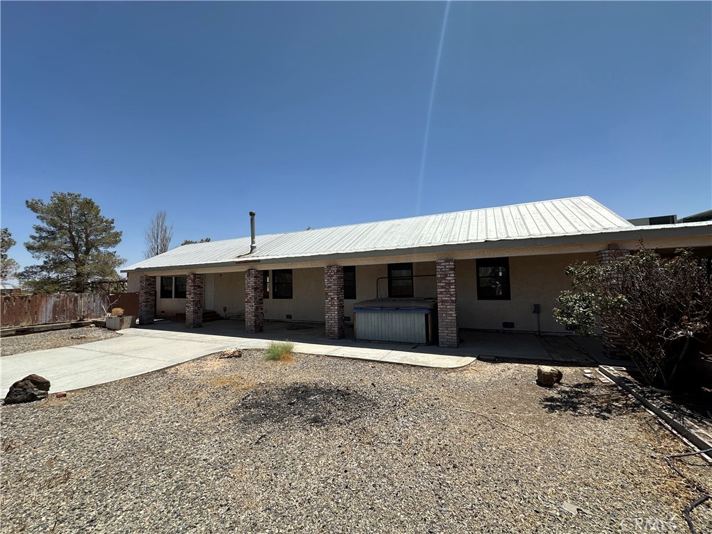 Two houses and a work shop on a big lot approximate 407,722 sqft. The main house is 3 bedrooms, 2 bathrooms. The second house is 1 bedroom and 1 bathroom. The mobile home on the lot with one bedroom and one bathroom. Solar is rented on the property from previous owner. Two separate Water wells is on the property.