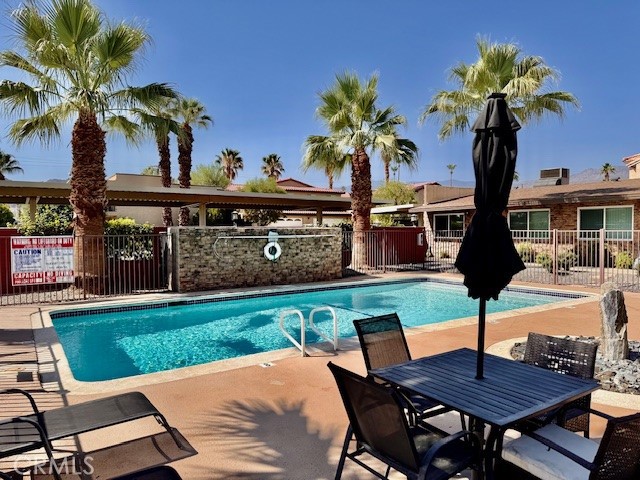 This garden-style 8-unit apartment complex was recently renovated The exterior of the property was completely remodeled with new exterior paint and stone, all new landscaping, remodeled pool area, BBQ/patio area, laundry facilities and upgraded Air Conditioning and new windows. The parking lot was resurfaced, new exterior lighting and security camera system. The unit has just been completely renovated with all new appliances including refrigerator, microwave, stove, and dishwasher. Wood floors, new paint, new blinds, and new hardware and ceiling fans.