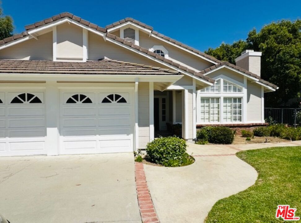 Views views views! Located in Westlake Village's highly desirable neighborhood of Three Springs, this gorgeous property is a rare and coveted single story home with 3 BR & 2.5 Baths. The property boasts outstanding 180 views of the surrounding rolling hills from both front and back yards.Located on a quiet cul-de-sac at the top of Bowman Knoll, this stunning home has been freshly painted, inside and out, with new hardwood floors, plush carpeting, and all new plumbing fixtures. It offers soaring ceilings, 3 fireplaces (decorative only), several skylights welcoming in plenty of natural light, a full laundry room, built-in bookcases, bountiful windows, and a long driveway with a huge 3-car garage. The bedrooms are large and spacious, and the gracious primary suite includes a comfortable living room area and fireplace, a huge walk-in closet, and a generous bathroom with a spa tub and shower. The delightful kitchen with a breakfast room opens to a garden patio. The elegant formal living room and dining room are perfect for entertaining, and the den/family room is the perfect place to relax and enjoy canyon views at the end of a long day. Relax in the sparkling spa, surrounded by the lush landscaping, including prolific Meyer lemon and grapefruit trees. Throw a couple of steaks on the built-in barbecue, and enjoy dinner al fresco, with pristine views on the covered patio with a classic wood arbor. Just minutes from lovely parks and the Westlake Lake, known for its exceptional yachting, fishing, shopping, recreation, and restaurants. Don't miss this gem!