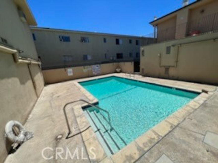 Upper level spacious one bedroom in Sun Valley. Complex features laundry room, pool, and parking, unit has laminate flooring throughout, granite countertops, wall unit ac, stove and refrigerator