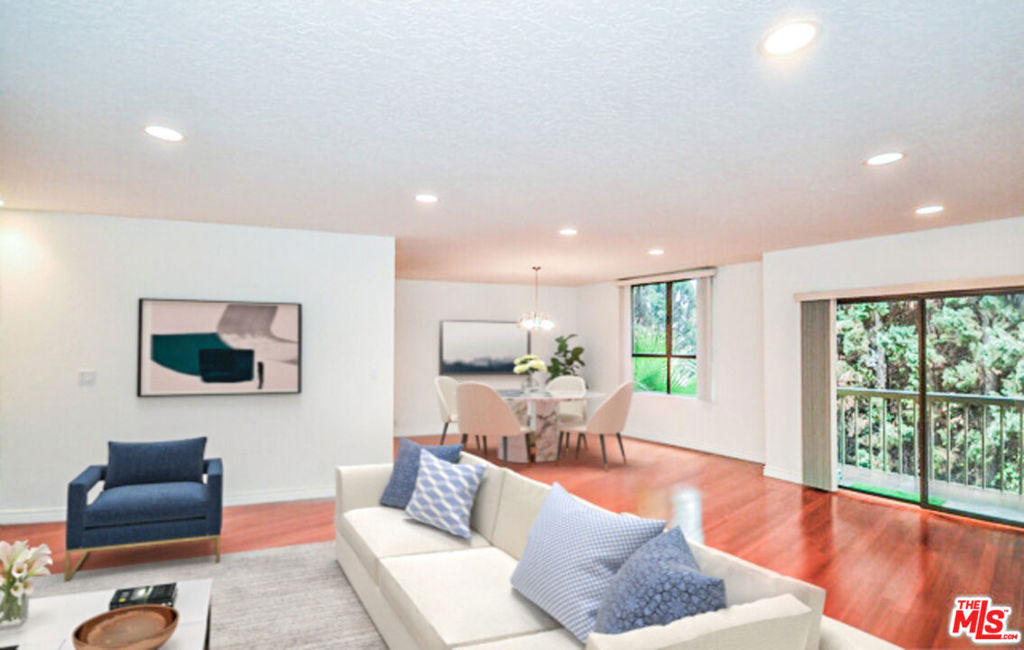 Beautiful 2 Bedroom, 2.5 Bath condominium in the prestigious Chateau Fremont community. Prime Hancock Park location. One of the largest unit in the complex. Luxurious master Bedroom and en suite Bathroom with very spacious walk-in closet. Roomy 2nd bedroom also has attached full bathroom and large walk-in closet. Brand new hardwood floors throughout condo. Huge open living room floor plan with fireplace and wet bar. Eat-in kitchen and formal dining room areas. Laundry inside in individual room with storage. Large balcony for relaxing. Central A/C and heating. Very charming and safe environment with good school district. This property is a must see!!!