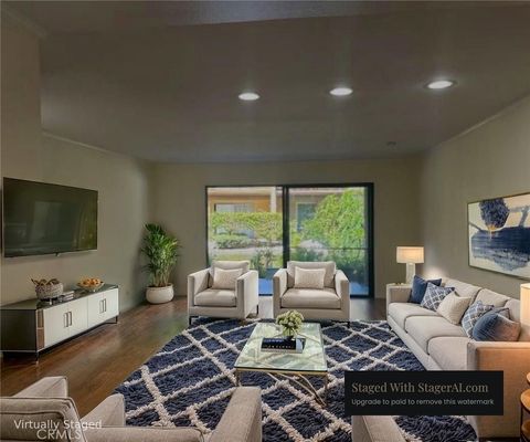 Photo of 124 Tangelo Unit 390, Irvine, CA 92618 (MLS # OC26063253)