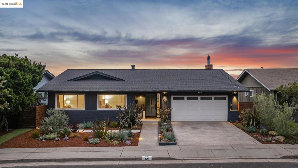 New listing. Sophisticated Mid-Century with dramatic Bay views. This stunning home blends timeless design with a thoroughly modern vibe. The light-filled main level showcases an open floor plan enhanced by a striking wood slat screen that artfully defines the space. The living and dining rooms feature walls of windows framing breathtaking Bay views. The newly remodeled gourmet kitchen boasts quartz countertops, stainless appliances, and generous cabinetry. A cozy eat-in nook offers the perfect spot to start your day or relax while the resident chef creates culinary masterpieces. Enjoy the ideal layout of three bedrooms and two baths, including a serene primary suite, all on the main level. Downstairs, versatility abounds with a spacious family room, fourth bedroom, large office, laundry room, and abundant storage. The family room seamlessly connects to the backyard. Sliding doors open out to an entertaining deck creating an ideal setting for indoor-outdoor living. The beautifully landscaped backyard provides room to relax and play. Conveniently located near parks, shops, and transportation. Open Sunday 2-4:30.
