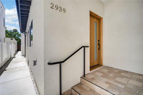 Photo of 2939 10th Avenue, Los Angeles, CA 90018 (MLS # SR26181723)