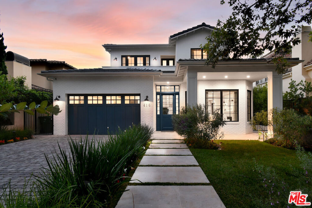 This Elegant Contemporary Traditional home is move in ready, as in, all you need to bring is your toothbrush! Located on a quiet and beautiful, tree lined street north of Montana Avenue in prime Santa Monica, this coveted home is filled with natural light, featuring soaring 10 foot ceilings and large windows, letting the sun shine in. The seamless indoor-outdoor flow creates an ideal setting for living and entertaining, with a sparkling pool and spa, waterfall, grassy area, built in BBQ and outdoor heaters to enjoy the peaceful and private backyard year round. The kitchen, a gourmet chef's delight, features marble countertops, an expansive island, double ovens, and top-of-the-line appliances.  6 Bedrooms, 8 bathrooms are ample room for the whole family- the primary suite showcasing vaulted ceilings, a cozy fireplace and french doors leading to a terrace. A whole home theater, gym, wine cellar and in-law suite compliment the open and light basement, which is accessible from the elevator accessing all 3 floors. Home was purchased brand new, and the owners put in all of the finishing touches- custom window treatments, designer runners, venetian plaster, lush landscaping, Savant whole home automation system with security cameras, automated gate and pedestrian gate, etc etc. Option for the perfect buyer to buy the home furnished. Welcome to 416 21st Place, truly a blend of luxury, comfort and sophistication!