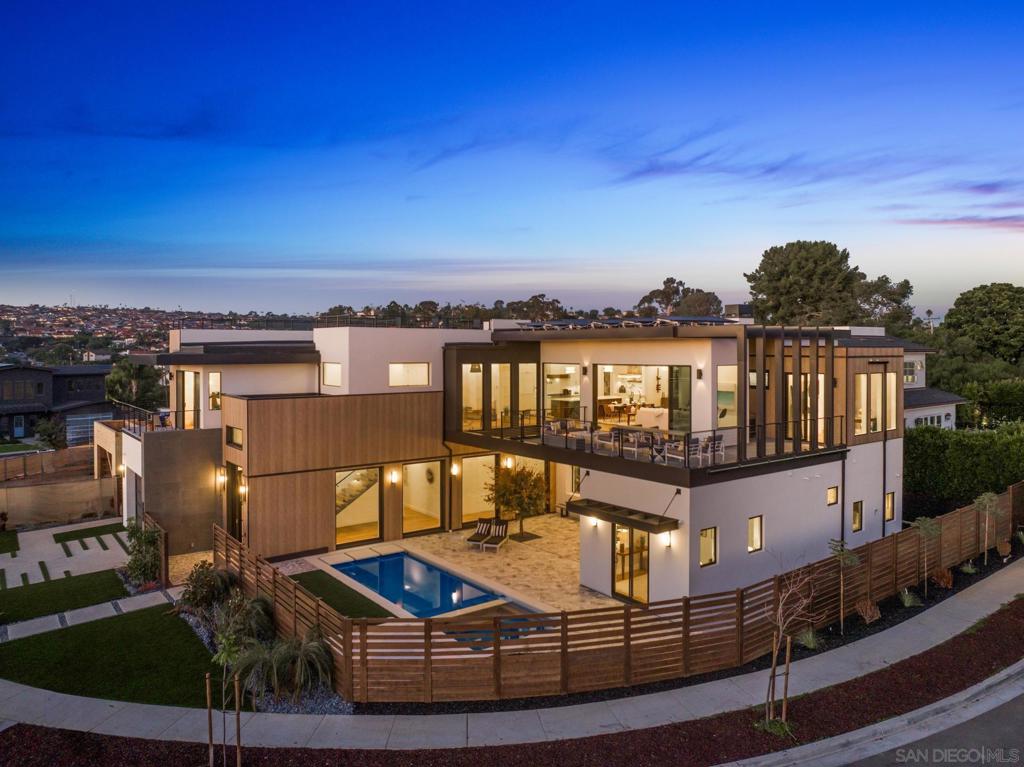 Welcome to where your soul will feel at home: Gordon Lane! The legendary PB surfboard brand (Founded by Larry Gordon) justifiably gets the recognition in the best sunlight - big, wide ocean views, clear sight of the breakpoints for surf, sun and sailing days and admiring the sunsets from the only brand new community in Pacific Beach. When you waltz into this home you will immediately feel the love and care that has gone into 5115 Gordon Lane. Luxury begins with the 10’ front door and windows casing the entry walkway, 12’ ceilings and angelic floating staircase all with a stunning view of the even more impressive green, blue, custom palm leaf tile and sunken fire pit yard. Did someone say there was a hidden door to the ADU? Yes! We hired James Bond for that idea (maybe, guess you will never know until you see the disclosures!). We won’t bore you with all of the extras - they are all here; whole house speakers, salt water pool, solar, top of the line appliances, a master closet the size of your first apartment, blah blah blah. The home is perfect for entertaining large parties and yet it’s also perfect for an intimate, quiet evening at home with your cup of coffee, or tequila, your choice. When you see what is in store for you, you will will never want to leave. Soak in every last sparkle of the water, light, skyline and hey! don’t miss that green flash (yes, it really exists!). The views will take your breath and your motivation for being anywhere else away before you can say, Gordon Lane! Plans available at request