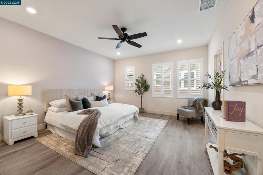 Looking for a home that is both polished and practical, with all the space you need and none of the compromise? Step into this 3-story beauty with 2,047 sq. ft. of luxury and upgrades. The first floor offers a private bedroom with ensuite bath and walk-in closet — perfect for guests, an office, or multigenerational living — plus a 2-car garage with storage and EV charger. On the main level, natural light fills the open-concept living space, designed for entertaining or cozy nights in. The chef’s kitchen features white shaker cabinets, quartz countertops, stainless steel appliances, an oversized island, and walk-in pantry. A private balcony is ideal for morning coffee or dining al fresco, and a powder room adds convenience with no need to share with guests. Upstairs, the primary suite boasts a stunning custom walk-in closet, spa-inspired bath with dual sinks, rain shower, and bidet toilet. A full bath with tub and two bedrooms offer space for family, guests, or work from home office. An oversized laundry room with storage is the ultimate in convenience. With 9’ ceilings, premium finishes, and abundant light, this Livermore home blends style and function. Just minutes from downtown, parks, wineries, and major highways, it’s the perfect place to begin your next chapter.