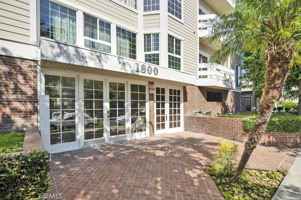 This second-floor condo is located in a four-story building, with the first floor dedicated to parking, making daily living incredibly convenient. Most areas have just been repainted, and select fixtures have been upgraded to LED, creating a bright and modern living space.The spacious living room features a cozy fireplace, and on either side of the fireplace are floor-to-ceiling glass sliding doors that lead to the balcony, allowing for a seamless indoor-outdoor flow and plenty of natural light. The open-concept living area also includes a convenient bar area, perfect for enjoying coffee or cocktails. The kitchen is fully functional, ideal for everyday cooking needs.Both bedrooms are en-suite, each with its own private bathroom, ensuring maximum privacy. The unit is also equipped with central heating and air conditioning, in-unit laundry, and secure parking.The location is ideal, just a short walk to the vibrant Sawtelle Blvd dining and shopping area, and only minutes away from UCLA, Santa Monica, Brentwood, Century City, and Beverly Hills. This condo combines modern upgrades with an unbeatable location, making it the perfect West LA home.