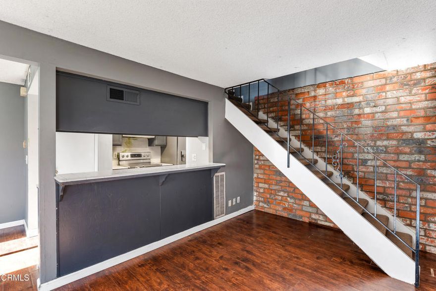 Discover the potential of this 2-bedroom, 1-bath, two-story condo located in the desirable community of Newbury Park. The main level features a functional layout with a living room, dining area, and kitchen, while both bedrooms and the full bathroom are privately situated upstairs.This condo includes access to a shared one-car garage with a private storage closet, plus an additional assigned parking space in the driveway. A shared community laundry room is conveniently located just behind the building.While the home is in need of upgrades and TLC, it offers a great opportunity to customize to your taste. The HOA maintains the landscaping and trash service and provides access to two community pools, a playground, and picnic areas.Ideally located near shops, dining, parks, and freeway access, this condo is perfect for buyers looking to invest in a property with excellent potential in a prime location.