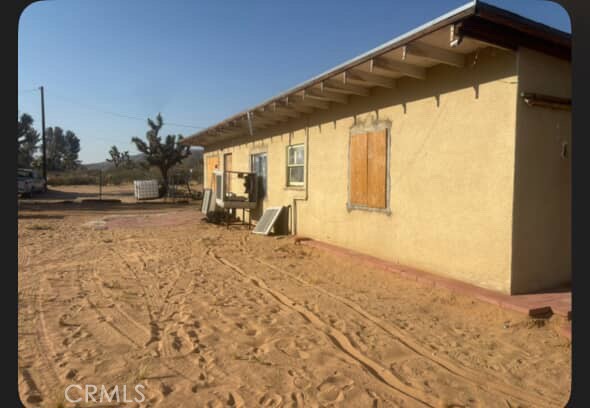 Nestled in fairview valley this property offers nearly 5 acres of land with utilities and a well available. Great opportunity to build something new with plenty of space or to refresh what's already there. Offers plenty of views and trails for off-roading and equine enthusiasts with acreage and rural privacy. There is an additional room that does not show on records or permitting that can easily be used for additional storage or living space. Buyers to verify all information and due diligence.
