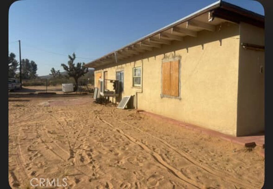 Nestled in fairview valley this property offers nearly 5 acres of land with utilities and a well available. Great opportunity to build something new with plenty of space or to refresh what's already there. Offers plenty of views and trails for off-roading and equine enthusiasts with acreage and rural privacy.  There is an additional room that does not show on records or permitting that can easily be used for additional storage or living space. Buyers to verify all information and due diligence.