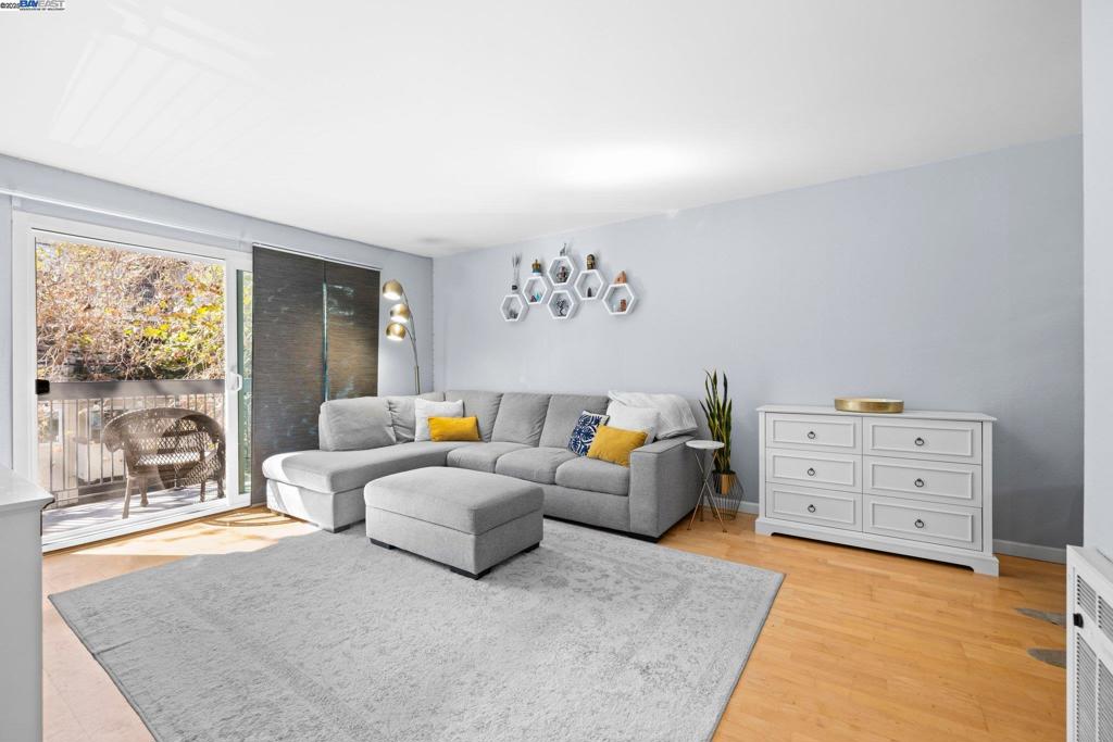 Discover the best of Oakland in this beautifully updated and brightly lit condo at The Oaks. The spacious kitchen features tile flooring, granite countertops, and stainless steel appliances. The open-concept design flows effortlessly from the dining area into a large living room, perfect for entertaining. The modern bathroom showcases a sleek pedestal sink, tile flooring, a tile accent wall, and a tub/shower combination. Additional highlights include gleaming floors, dual-pane windows, updated light fixtures, a serene balcony, community laundry, and a garage parking space. Conveniently located near Lake Merritt, Grand Lake, and Piedmont Avenue, with easy access to the 580 for a quick commute. Whether you enjoy spending time outdoors by the lake, discovering new restaurants and cafés, visiting art galleries, or exploring the neighborhood car-free, this ideally located home puts you in the heart of it all with a WalkScore® of 84!