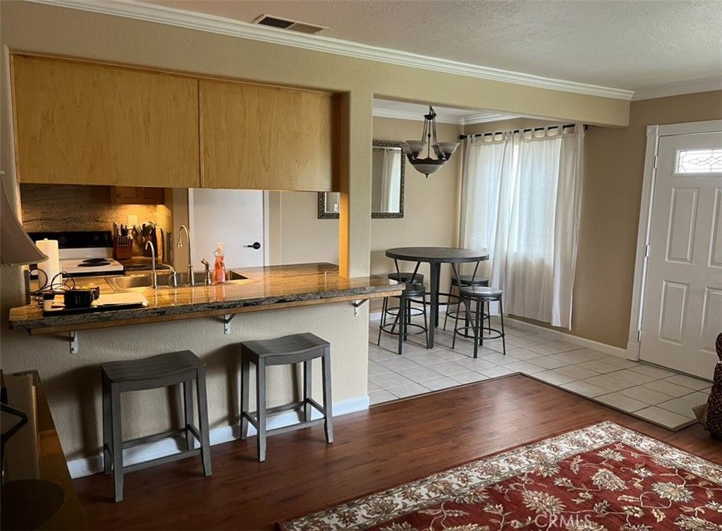 Photo of 16673 Arbor Cir, Huntington Beach, CA 92647 (MLS # OC26015130)