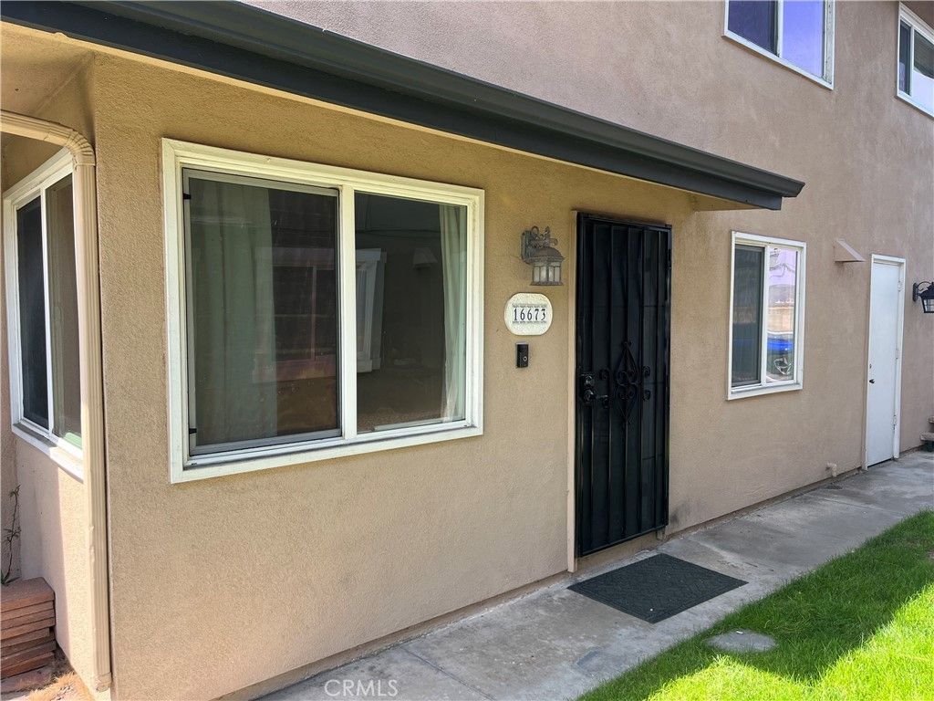 Photo of 16673 Arbor Cir, Huntington Beach, CA 92647 (MLS # OC26015130)