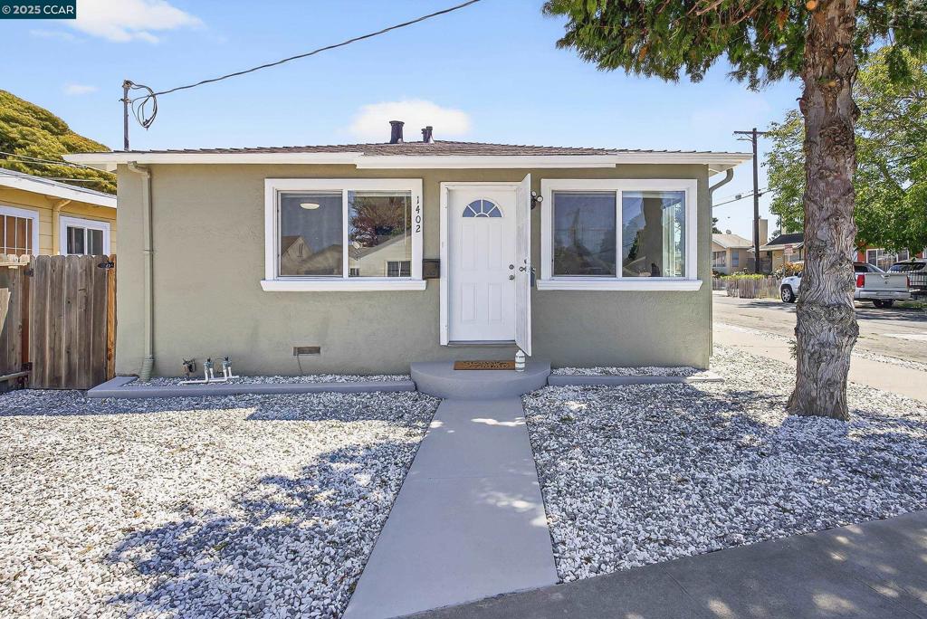 Very nice house & ready to move into. Updated kitchen with new quartz counter tops and new flooring. Dishwasher, stove & refrigerator. Dual pane windows w/ new blinds. Interior & Exterior freshly painted. New Roof, Section One Termite Clearance. Large level corner lot with off street parking. Very clean home!