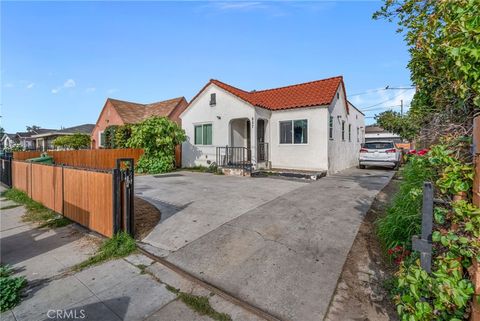 Photo of 827 E 97th St, Los Angeles, CA 90002 (MLS # RS25280462)