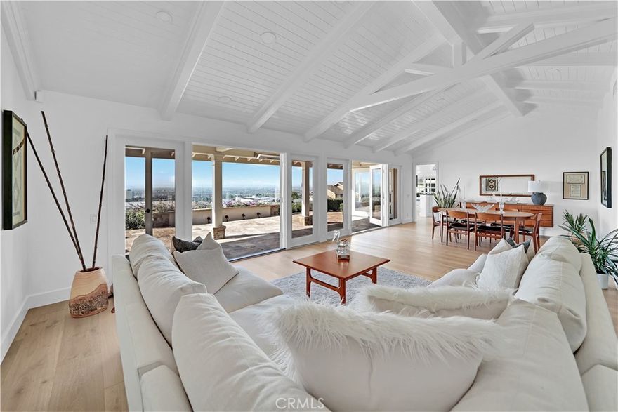 The beautiful quintessential California ranch style home has undergone complete recent remodel. Rarely available single story is located on Spyglass Hill, in the heart of Corona Del Mar. Fabulous panoramic views of the Pacific Ocean, Catalina and San Clemente islands, Newport Pier, along with other notable landmarks of the coveted town. Primary suite envelopes one in the luxury of captivating views and ultimate comfort. The home offers 4 sizable bedrooms. One of them is currently converted into an office, overlooking well landscaped charming, very private front yard and the pool.  The home has an open floor plan and is filled with abundance of natural light. Proximity to local shopping, beaches, easy commute, convenience of John Wayne airport and selection of best schools puts it on the top of the list.