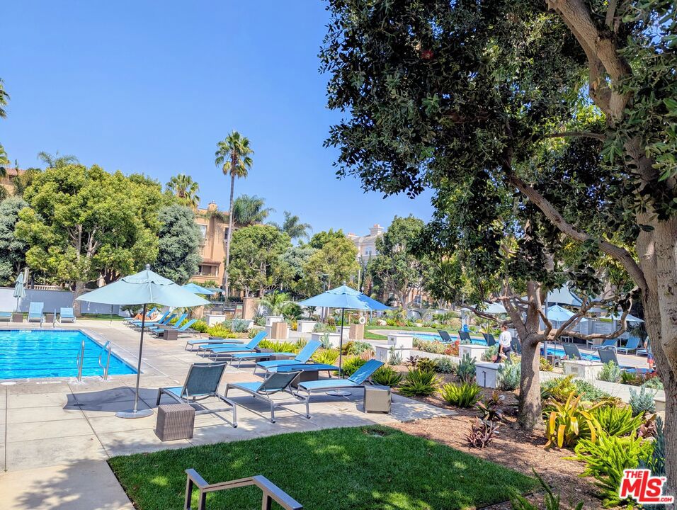 Step into Luxury in the most desired Playa Vista Neighborhood with all of the amenities of a Luxury Hotel. This stunning 2-bedroom, 2-bathroom, single-story condo corner unit. Tastefully designed home boasts a bright, open layout, seamlessly connecting the gourmet kitchen, dining area, and living room adorned with custom built-ins. The gourmet kitchen features exquisite stone countertops, premium stainless steel appliances, ample cabinet space, and a versatile area ideal for a desk, office, or breakfast nook. Your spacious private patio perfect for a BBQ, entertaining guests, or unwinding after a long day. Both bedrooms in this exquisite condo are ensuite and generously sized, each featuring spacious walk-in closets. The primary bedroom offers a haven of comfort, complemented by a luxurious bathroom with dual vanities, a separate walk-in shower, and a soothing soaking tub. In unit laundry closet is equipped with a stacked washer and dryer, along with additional cabinet space. The unit includes two parking spaces and extra storage. Residents enjoy access to an array of premier amenities, including the Center pointe Club pool and fitness center, The Resort, tennis courts, Concert Park, Runway Retail Center, and so much more. Embrace the vibrant Playa Vista lifestyle with unparalleled convenience and luxury at your doorstep. Also for Lease. All material presented herein is intended for information purposes only. While this information is believed to be correct, it is represented subject to errors, omissions, changes or withdrawal without notice. Broker and Broker's agent(s) do not represent or guarantee accuracy of the square footage, bedroom/bathroom count, lot size or lot dimensions, permitted or un-permitted spaces, school boundary lines or eligibility, information obtained from Public Records or other sources or other information concerning the conditions or features of the property provided by the seller or obtained from public records or other sources. Buyer is advised to independently verify the accuracy of all information through personal inspection building permits and/or with appropriate professionals (i.e. attorney, appraiser, architect, contractor, etc.). and with appropriate professionals to satisfy themselves. EQUAL HOUSING OPPORTUNITY.