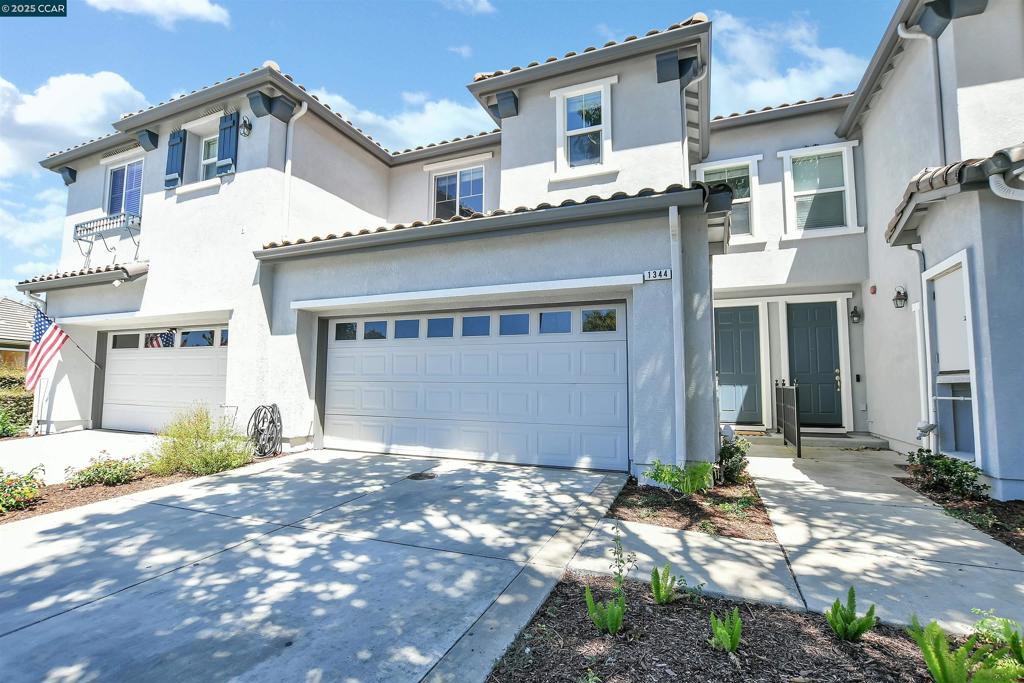 Location is everything! This beautifully maintained 3-bedroom, 3-bathroom townhome is located in the highly desirable gated Copper Gate community of Brentwood. Offering approximately 1,483 sqft of comfortable living space, this home is situated near the end of a quiet lane and features a full-sized driveway, an uncommon find in the community. Inside, you'll find a bright and welcoming layout with stylish laminate flooring throughout. There is a half bath located downstairs. All three bedrooms and two full bathrooms are upstairs, providing privacy and space. The home also features a private patio with no rear neighbors. The HOA has recently painted the outside. Enjoy the resort-style amenities of the Copper Gate HOA, including a community pool, playground, clubhouse, and greenbelt areas. Conveniently located close to shopping, schools, parks, and commuter routes.