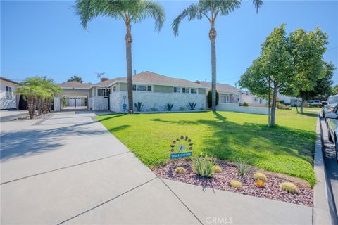 Photo of 7826 Arnett Street, Downey, CA 90241 (MLS # SW26166647)