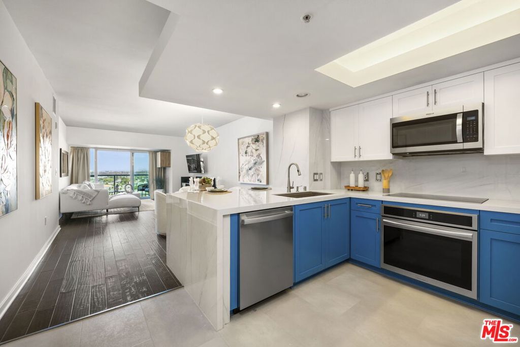 Live In Luxury... Beautifully remodeled designer, 1 bedroom, 1.5 bathroom condo in full-service Azzurra. Experience luxury coastal living at its finest.. Whether you're lounging on the rooftop with friends, biking along the beach with your new beach cruisers, or working out in the newly updated indoor-outdoor fitness center with spa, sauna.. Azuurra offers it all...Enjoy breathtaking marina sunset views. This property offers an open floor plan, maple hardwood floors throughout, a newly remodeled kitchen featuring a new porcelain waterfall countertop and backsplash, new cabinets, pantry, all new stainless steel appliances, a huge walk-in upgraded custom California closet, 9-foot ceilings, and an extra-large patio perfect for entertaining. Seller is including a 55" LG TV, LG Sound bar, Yamaha Receiver & Klipsch speakers, and 2 Beach Cruisers. This condo is the lowest price, best value 1 bed 1.5 bath in Azzurra. More amenities & services include Valet, concierge, rooftop sky lounge, 2 spas, pool, conference room, fitness center, Yoga/Pilates studio, fine art collection, and more.. This condo offers an unbeatable blend of comfort, convenience, and Lifestyle. Don't miss this opportunity.. MUST SEE...