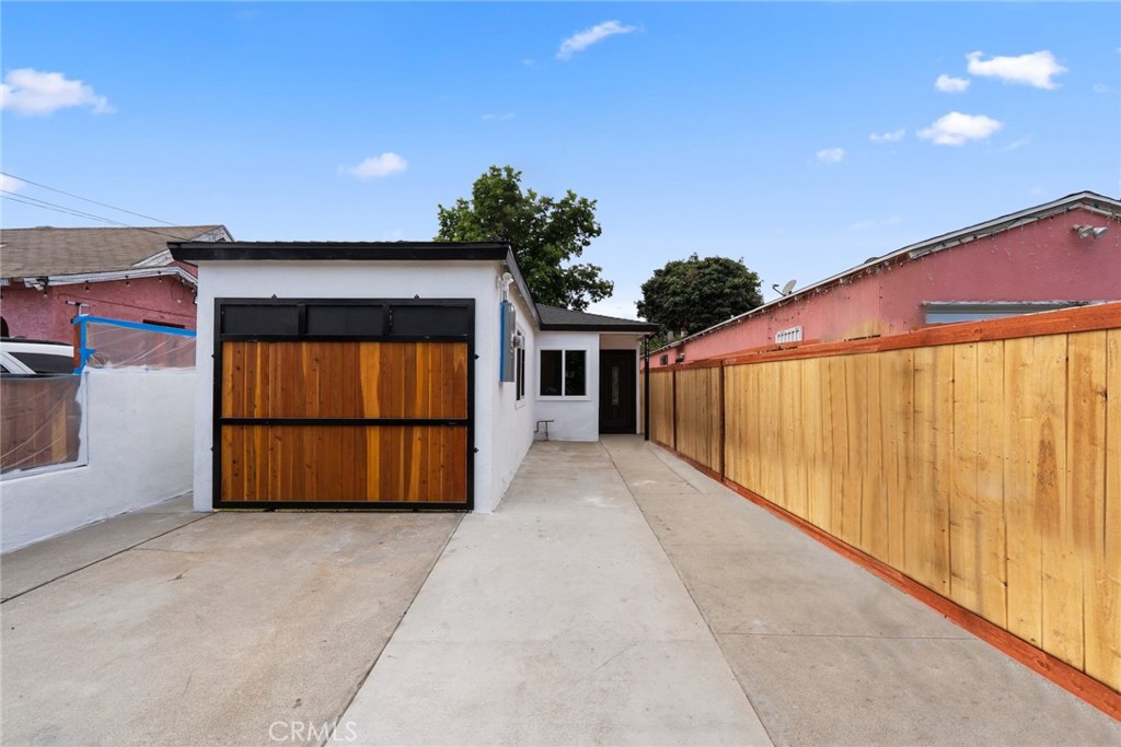 Don’t miss this completely remodeled property—it's simply amazing! Featuring brand-new flooring, a new roof, new bathroom, fresh interior and exterior paint, and a beautifully updated kitchen with an elegant added fireplace. The home also includes a spacious bonus room, automatic entry gates, new windows, and new front and back doors.
The front patio has been upgraded with concrete, offering comfort and easy maintenance, while the private backyard is beautifully finished and perfect for relaxing or entertaining. The home is equipped with a brand-new central A/C system.
The kitchen is a true showstopper—tastefully remodeled with a large island, perfect for enjoying meals, and a stunning chandelier for a touch of elegance. New appliances are included: washer and dryer inside, refrigerator, and more.
Bonus: This amazing property already has approved construction permits for a second unit—offering great potential for future expansion or source of income!!
