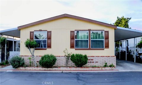 Photo of 24922 Muirlands Blvd #91, Lake Forest, CA 92630 (MLS # FR26047714)