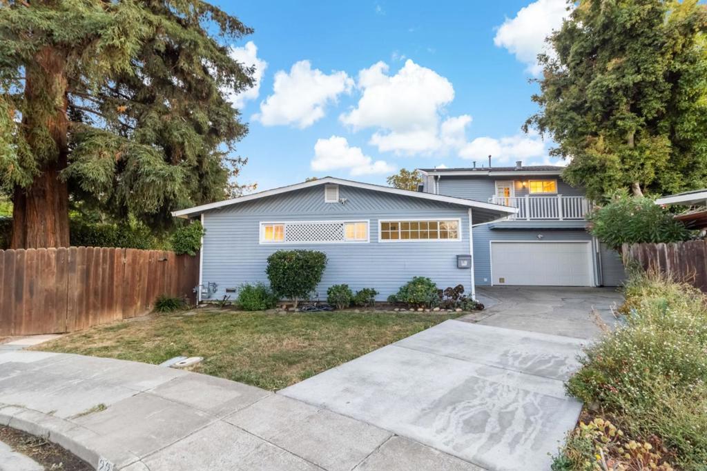 Beautifully updated 4-bedroom, 3-bath home on a quiet cul-de-sac! Main level features 3 bedrooms, 2 baths, and refinished hardwood floors, while the upstairs suite offers a bedroom, bath, and full kitchenperfect as a separate unit or part of the home. Freshly painted, light-filled interior with a flexible floor plan. Huge 2-car garage plus extra storage with roll-up door. Expansive yard with large deck for play, gardening, and entertaining. Fantastic location near Marsh Manor shops, dining, gym, and grocery, with quick access to Hwy 101 for easy Peninsula commuting.