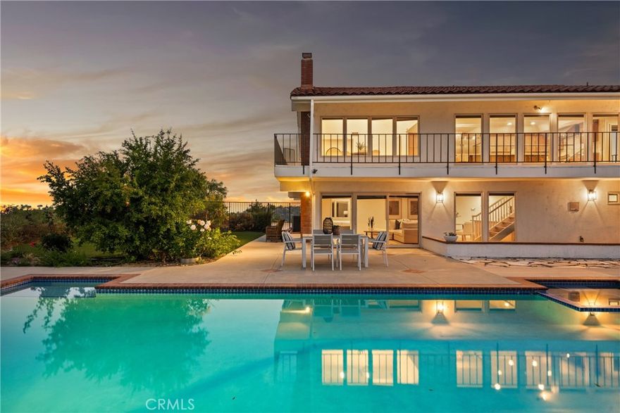 A Private Blufftop Sanctuary with Panoramic Views. From the moment you step through the front door, the view takes your breath away - and it never lets go. Every room in this home captures a different frame of the surrounding beauty.

Tucked behind private gates in Cowan Heights, this distinctive property offers sweeping, unobstructed views from every room- from Peter’s Canyon to the coastline of Fashion Island. Recently updated with designer finishes, it blends custom architecture with a calming, on-trend interior palette.

Perched on a blufftop lot, the grounds feature a saltwater pool and spa, new turf, and garden spaces ideal for entertaining or unwinding. A long driveway provides generous parking and leads to a three-car attached garage.

Inside, a dramatic vaulted foyer opens to multiple light-filled living areas and a fully remodeled chef’s kitchen with custom oak cabinetry, quartz countertops, and premium appliances, including a GE Monogram range and a Frigidaire built-in fridge/freezer.

A spacious view from the terrace with built-in BBQ extends the living space outdoors.

Downstairs, a private suite with its own kitchen, living area, bedroom, and full bath offers direct, step-free access—perfect for multi-generational living, guests, or rental use.

Additional highlights include updated bathrooms, new luxury vinyl plank flooring, and a full suite of energy-efficient upgrades: fully owned solar, new HVAC systems, LED lighting, and a smart irrigation system.

Just minutes from top-rated schools, hiking trails, and some of North Tustin’s treasured conveniences- 10181 Overhill Drive delivers privacy, versatility, and elevated North Tustin living. It’s the kind of home where the first thing you notice - and the last thing you’ll forget - is the view. Every space is designed to showcase the panorama.