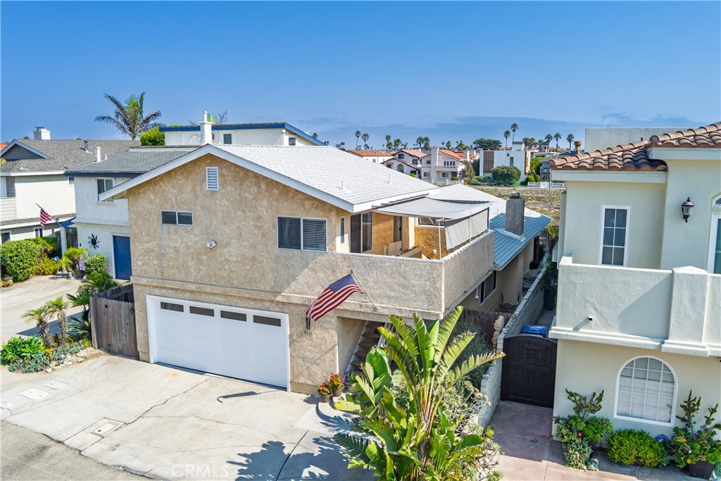 Beach Living at Its Finest in Mandalay Shores!
Just steps from the sand, this light-filled, open concept two-level home captures the essence of coastal living with soaring ceilings and a seamless flow between indoor and outdoor spaces. With no neighbor behind and a protected dune area as your backdrop, enjoy privacy and direct access to the beach path. The main level features two bedrooms, including a serene master ensuite. Upstairs, a permitted attached retreat offers its own private entrance, bedroom, full bath, living room, and kitchenette—perfect for guests or extended stays.
Entertain or unwind on the private backyard patio with custom wood decking and savor the true Mandalay Shores lifestyle.
*Recent upgrades include a new roof (2023) and tankless water heater (2024).