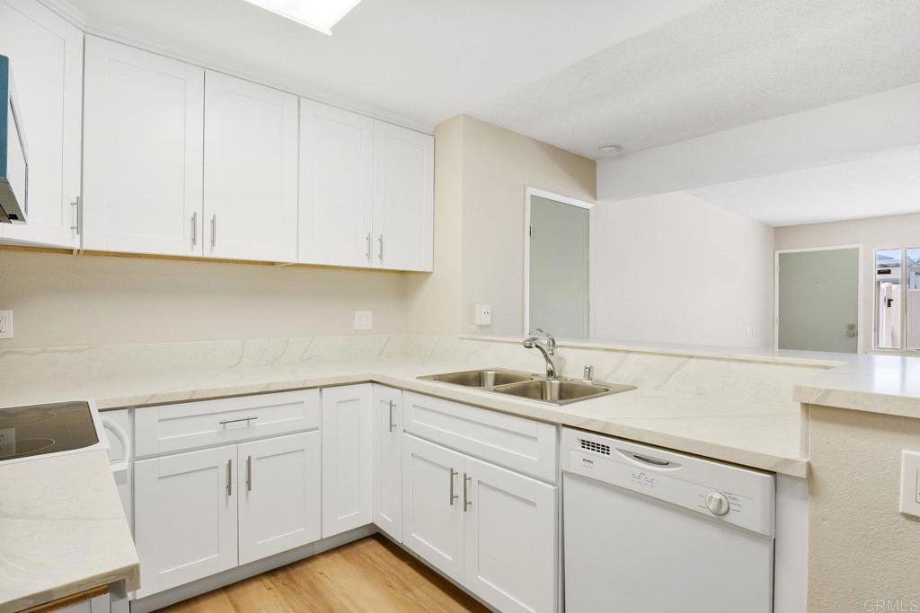 Updated and Spacious! Move in ready 3 bedroom, in the Del Cerro/Allied Gardens area! Newer updated kitchen, freshly updated bathrooms, new flooring and paint throughout! Tasteful upgrades galore! Just steps from community laundry and great amenities, such as the sparkling pool, jacuzzi, BBQ area, sauna, fitness room, club house and tennis court! Close to all, including Mission hiking trails! Includes 2 assigned carport parking spaces!