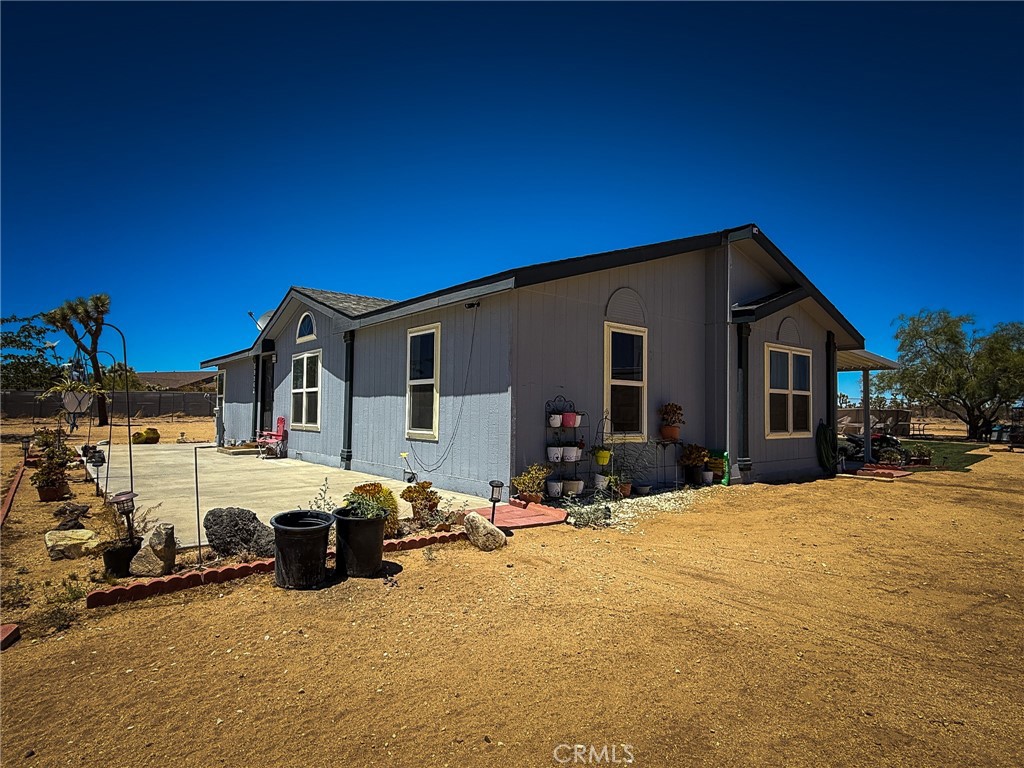 Charming Desert Retreat on Over 2 Acres – Yucca Valley, CA
Welcome to your private desert oasis! This beautiful 3-bedroom, 2-bath manufactured home on permanent foundation sits on over 2 acres of fully gated land, offering the perfect blend of comfort, space, and privacy in the heart of Yucca Valley.
Enjoy panoramic views and open skies, nestled in the serene high desert. This well-maintained property features two separate entrances, making access easy and flexible for guests or RVs. Speaking of RVs — there’s a dedicated RV hookup on site, ideal for visitors or full-time living.
Step inside the spacious home with a functional layout, ample natural light, and modern comforts. Outside, you’ll find two large storage sheds for all your tools, gear, or creative projects.
With plenty of room to expand, garden, or simply enjoy the peaceful surroundings, this property offers endless possibilities — all just a short drive from Joshua Tree National Park, shops, dining, and local attractions.
Don’t miss this opportunity to own a piece of the high desert lifestyle!