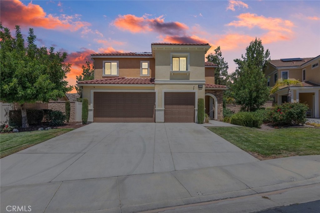 ***BUILDER MODEL HOME - GEN-SUITE - PAID OFF SOLAR & BACKUP BATTERY - END OF CUL-DE-SAC*** Welcome to the 36262 Pursh Drive in the award winning Canyon Hills community, where this highly upgraded former model home sits proudly at the end of a quiet cul-de-sac. Boasting a paid-off Tesla solar system with backup battery, this two-story beauty offers the perfect combination of elegance, efficiency, and functionality. With 4 bedrooms, 3.5 bathrooms, a spacious upstairs laundry room, and a large game room, there’s plenty of space for everyone. Upstairs you’ll find three generously sized bedrooms, including a luxurious primary suite complete with dual walk-in closets, soaking tub, and a beautifully designed shower. Downstairs features a rare second primary suite with a full bathroom, walk-in closet, and its own laundry closet—ideal for guests, in-laws, or multigenerational living. The open-concept living space is flooded with natural light thanks to soaring ceilings and a tall bi-parting sliding glass door that leads to the backyard. The gourmet kitchen is a showstopper with a massive granite island, stainless steel appliances, custom backsplash, pendant lighting, and an abundance of warm-toned cabinetry, including a large pantry and under-sink water heater. A custom wood plank accent wall adds a stylish touch to the living room, while the California room-style covered patio invites you to enjoy outdoor living year-round. The backyard has been newly landscaped with drought-tolerant plants and several fruit trees, creating a private and peaceful escape. Additional features include a 3-car garage, central vacuum system, tankless water heater, indoor fire sprinkler system, and recessed lighting throughout. Located in the award-winning Canyon Hills community, you’re just a short walk from top-rated schools, three parks, dog parks, a splash pad, and amazing resort-style amenities including three pools, spas, sports courts, and more. With thoughtful design, energy efficiency, and model-home quality throughout, this home checks every box. Don’t miss your chance to own one of the most impressive homes in Canyon Hills.