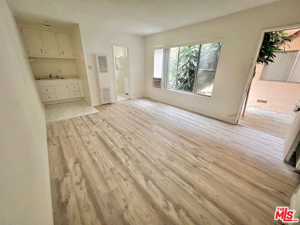 Nestled in the vibrant heart of Echo Park just off Sunset Blvd, this charming renovated studio offers a cozy retreat with modern touches. Boasting dual closets and a beautifully appointed bathroom complete with ample storage and a relaxing bathtub. This unit also features a dedicated kitchenette equipped with a sink, countertop, and storage cabinets for added convenience. This inviting space is ready for its new resident to move in and make it their own! Laundry facilities on-site and the possibility of parking availability in the near future. Enjoy easy access to nearby stores, cafes, shops, and excellent freeway connections, making this an ideal urban oasis for comfortable LA living.