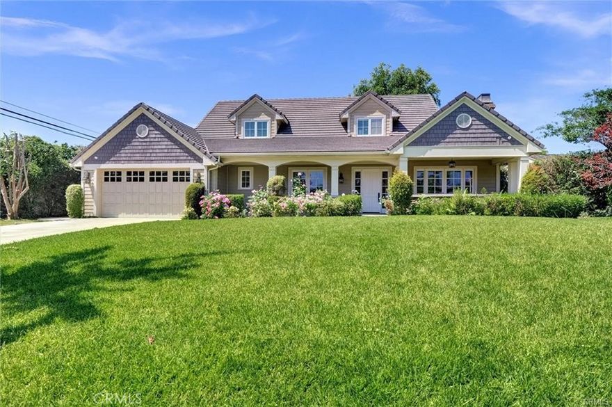 This exceptional, custom-built two-story home is nestled in the prestigious Lower Rancho neighborhood of Arcadia. Meticulous craftsmanship and incredible attention to detail are evident throughout  A light-filled entry welcomes you with access to either the elegant formal living room—complete with a full wall of built-in bookcases—or the expansive formal dining room. Both rooms overlook the beautifully landscaped front yard and offer stunning views of the San Gabriel Mountains. A wide central hallway leads into an inviting family room with a cozy fireplace, seamlessly connected to the serene backyard. The open-concept kitchen is a chef’s dream, featuring granite countertops, an oversized center island, and a bright breakfast area. Additional highlights include a large walk-in pantry, a dedicated wine room, a mudroom, and a separate laundry room—each thoughtfully designed for functionality and style. Three well-appointed bedrooms are located on the first floor along the sunlit south-facing hallway, which also provides direct access to the backyard. The private second level is home to the luxurious master suite, complete with dual walk-in dressing rooms with built-ins, an expansive master bathroom, and a private office—an ideal retreat. The park-like backyard, adorned with mature, professionally designed landscaping, creates a tranquil oasis perfect for outdoor entertaining. Don’t miss this rare opportunity to own a truly one-of-a-kind home in one of Arcadia’s most sought-after neighborhoods!