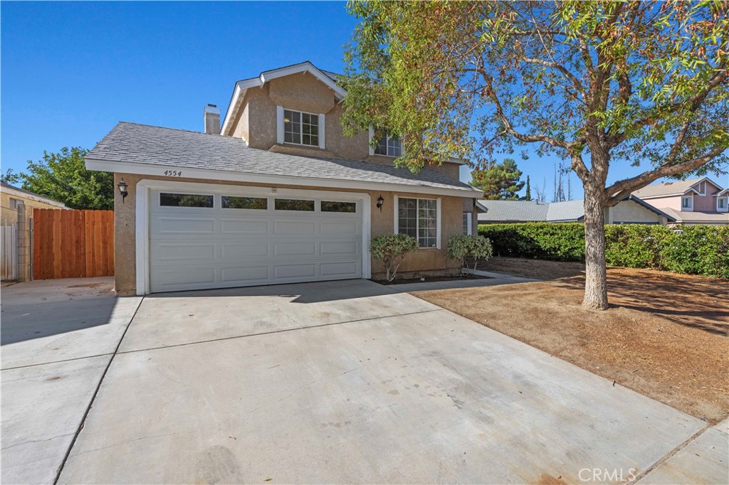 Welcome to this Beautifully Updated Palmdale Home! 3 Good Size Bedrooms Plus a Bonus Room! Featuring a Brand-New Roof, Block wall Fence, New Garage Door, Fresh Interior Paint Throughout, and All-New Laminate Flooring Downstairs, Formal Dining Area. This Residence is Move-in Ready. Enjoy the Comfort of New Carpet in the Upstairs Bedrooms, Double Sink in Master Bathroom, New Mirrors, Upgraded Lighting in the Kitchen, and Modern Touches including Quartz Kitchen Countertops. Stainless Steal Appliances and New Sliding Door, New Garbage Disposal, New Bathroom Cabinets and Including New Toilets. Conveniently Located Within Walking Distance to Target, Home Depot, Vallarta Supermarket and Restaurants. yet Tucked Away in a Quiet Neighborhood. This Home Offers the Perfect Balance of Accessibility and Peaceful Living. You Will Love It!!!!