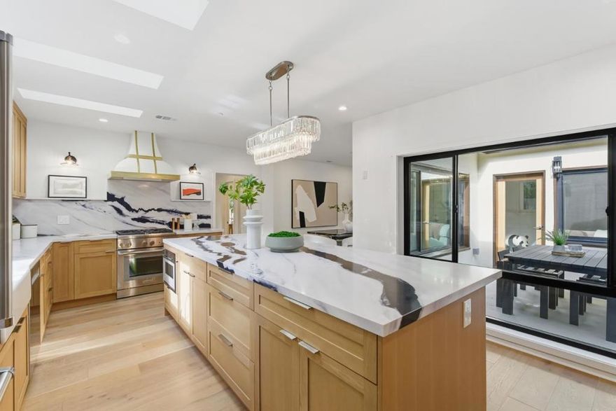 Welcome to 194 Oak Court. This gorgeously reimagined and expanded Willows charmer has both the cozy historic touches as well as a modern open living concept with state of the art finishes making modern living and charm go hand in hand. The kitchen has white oak cabinetry and bold quartz counters with Thermador and Viking appliances suitable for a master chef. The ornate hood has a high capacity venting system. Smart home features such as the sprinkler system and the water filter is just one of many. The expansive sliding glass doors let natural light in from the garden. The master suite opens up to the garden. With a walk-in closet and adjacent bath there is privacy with a separate entrance.the bathrooms are chic with organic chosen tiles and happy toilets. The dining area leads out to the enclosed courtyard where dining al fresco is enjoyed. The neighborhood and especially Oak court has block parties and a tight knit community. Close to the Willows market and the shopping strip with pottery and dance studio is nearby. Close to downtown Menlo Park and downtown Palo Alto. Close to Stanford. Highway 101 and Caltrain. There is to many features to mention come see 194 oak Court for yourselves!